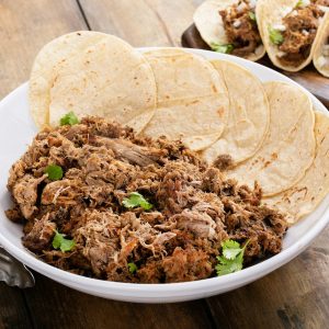 Mexican pork carnitas weith corn tortillas, ready to eat