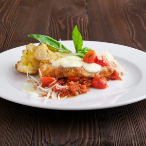 Roasted chicken fillet with tomato cherry, parmesan and crouton
