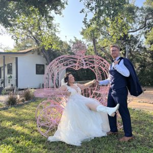Intimate micro wedding ceremony at Mimi’s Private Barn in Leander, TX with rustic barn backdrop, outdoor seating, and Hill Country views.