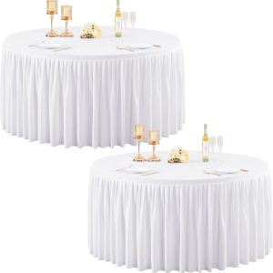 White fitted spandex table cover on a 48-inch round table for weddings and event décor.